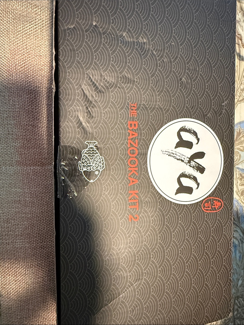 The Bazooka Kit 2 Decorative Black Box with Red Logo. Sushi making kit